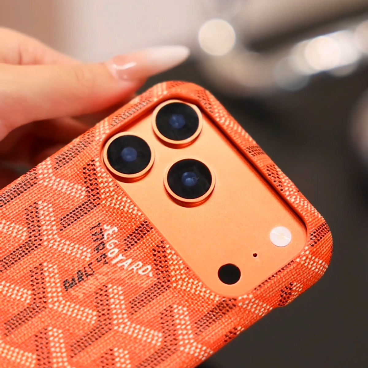 Funda de iPhone naranja texturizada de lujo: cubierta protectora elegante a prueba de golpes