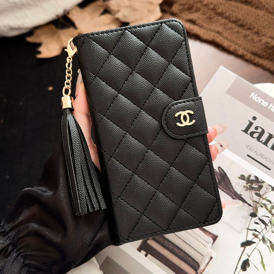 Funda de lujo tipo billetera acolchada para iPhone con borla y cierre dorado