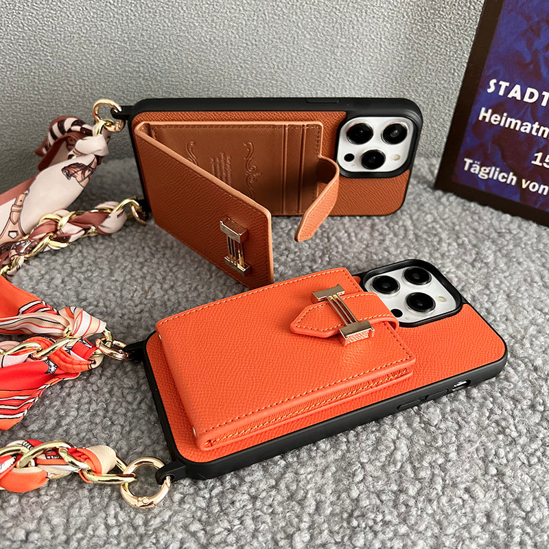 Funda de iPhone de cuero con bufandas y bolso de tarjeta H